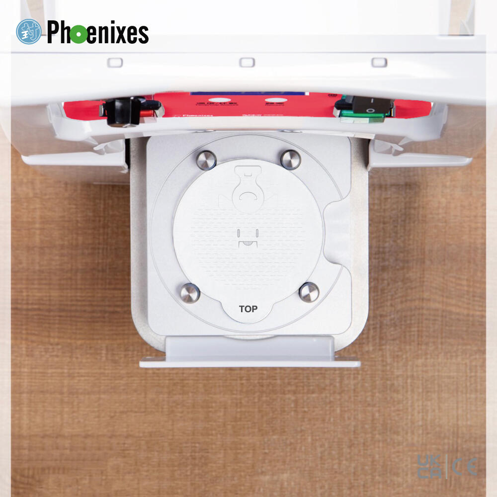 Top view of a round precut lid positioned on the cup mold of the Phoenixes PH-989H